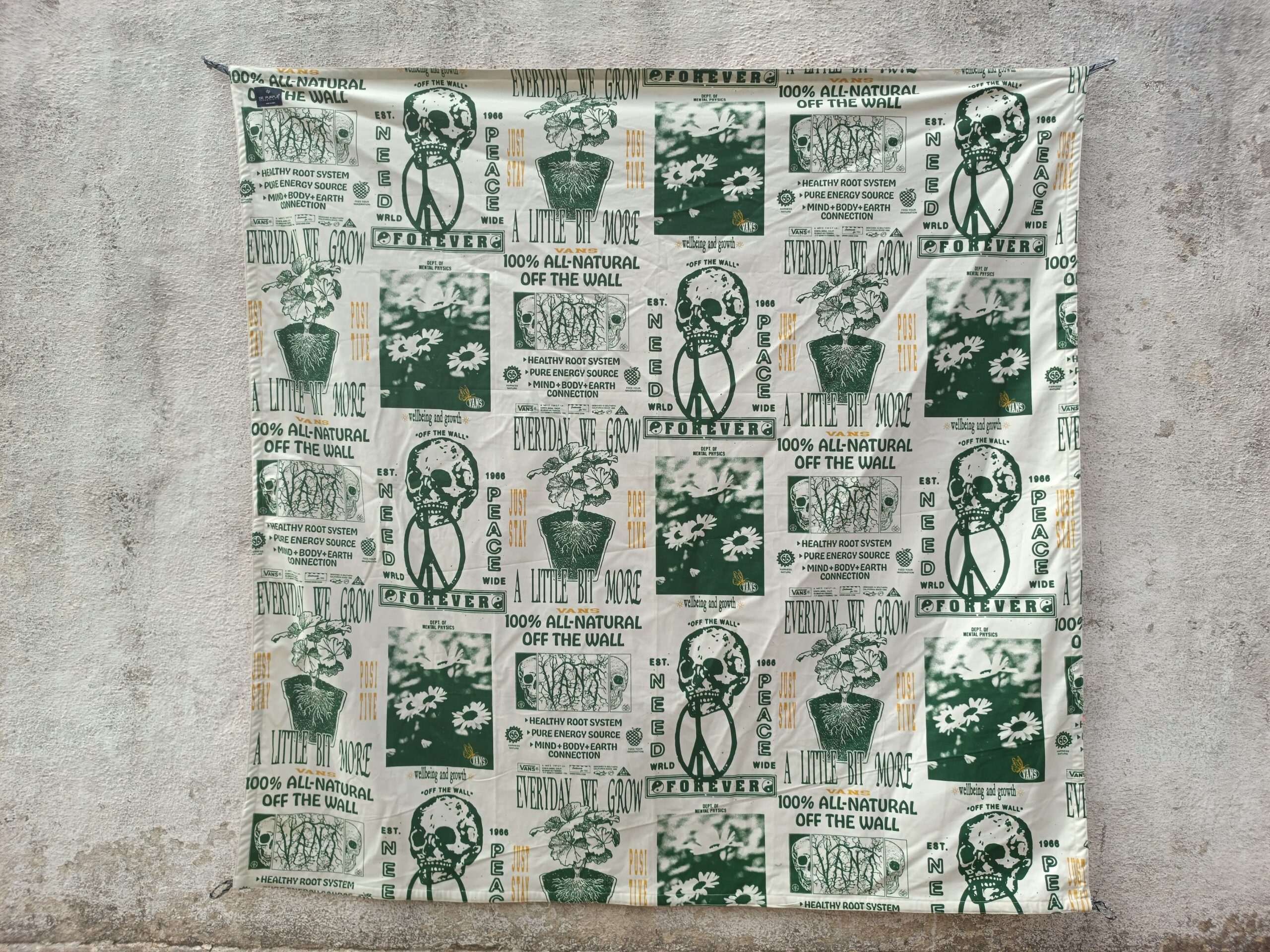 Beige and green skull prited unique textile piece serves as both a functional table mat and a captivating wall accent, adding a touch of artistry to your living space.Lay it on your dining table to protect your surfaces or hang it on your walls to add a splash of colour and culture to your decor.